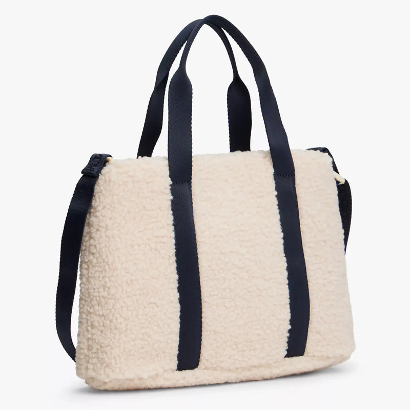 Back of the Tommy Hilfiger cream monotype bag.