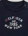Closer view of the Tommy Hilfiger monotype t-shirt.