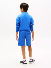 Back of the Tommy Hilfiger blue monotype track shorts.