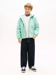 Boy wearing the Tommy Hilfiger padded jacket.