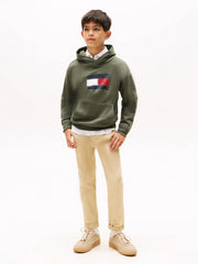 Boy wearing the Tommy Hilfiger painted flag hoodie.