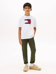 Boy modelling the Tommy Hilfiger painted logo t-shirt.