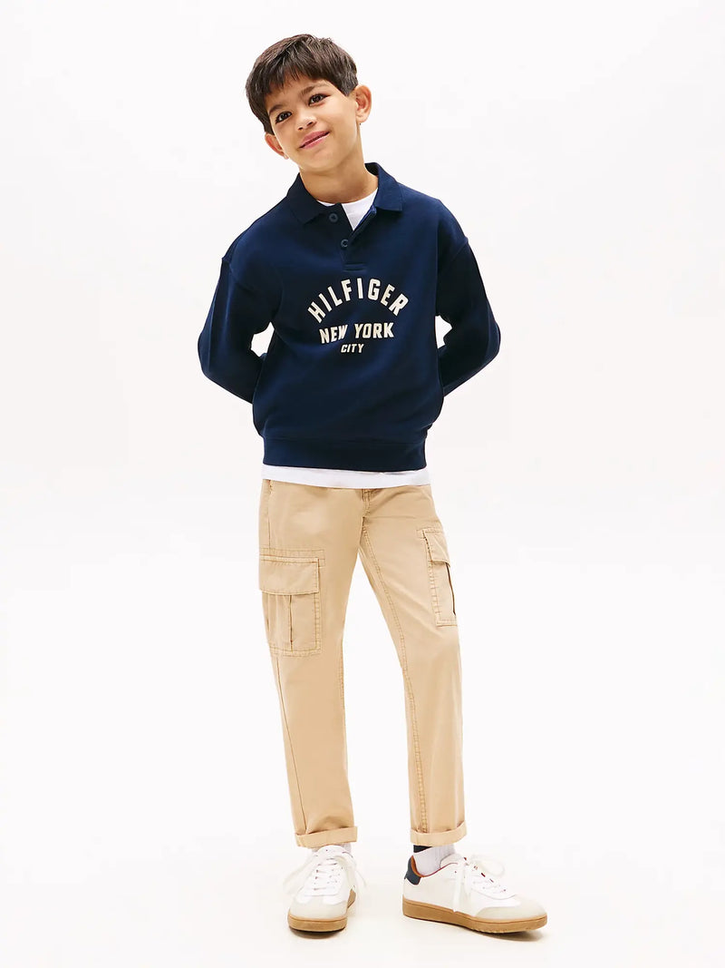 Boy wearing the Tommy Hilfiger polo collar sweatshirt.