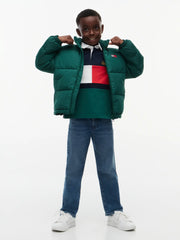 Boy wearing the Tommy Hilfiger puffer jacket.