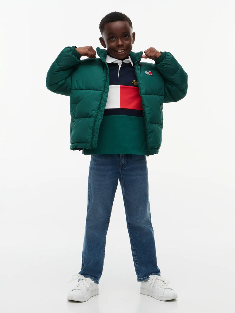 Boy wearing the Tommy Hilfiger puffer jacket.