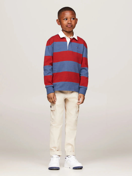 Boy wearing the Tommy Hilfiger rugby shirt.
