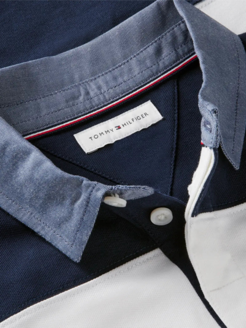 Closer look at the Tommy Hilfiger rugby shirt showing detail of the contrasting grey collar.