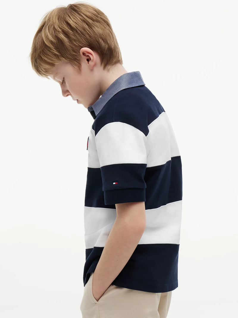 Tommy Hilfiger rugby shirt with embroidered flag branding on the sleeve.