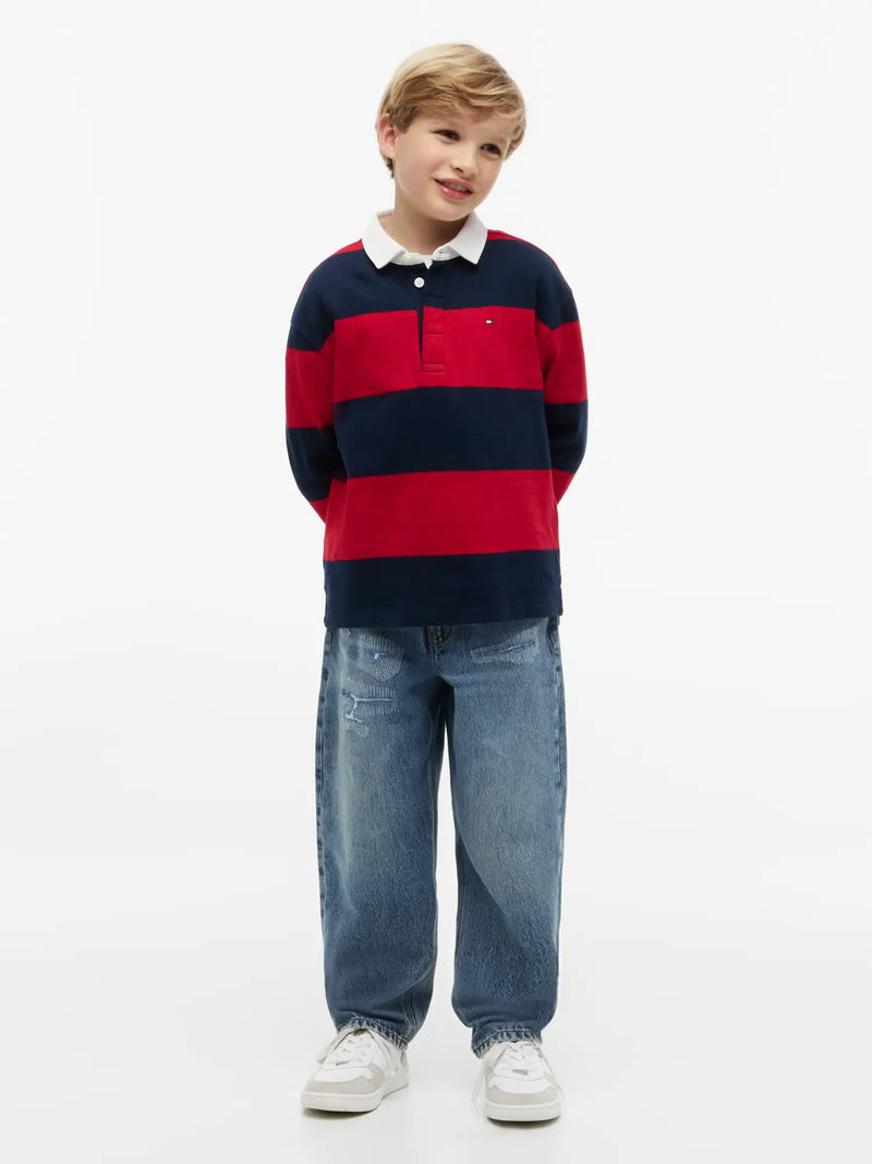 Tommy Hilfiger red rugby shirt, modelled by boy.