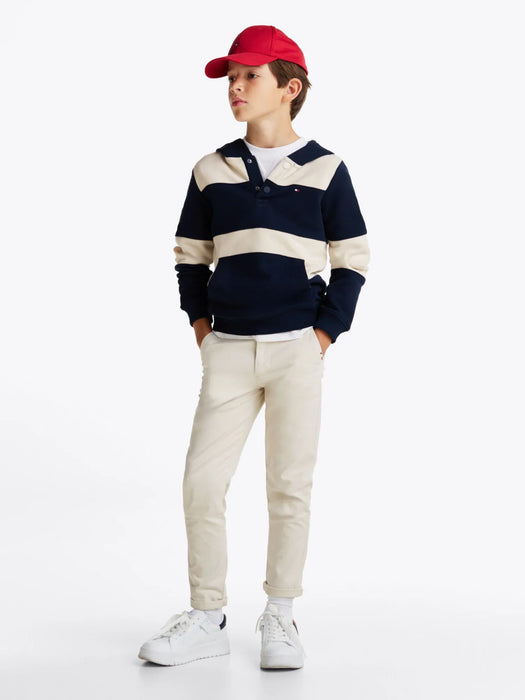 Boy wearing the Tommy Hilfiger striped hoodie.