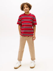 Boy wearing the Tommy Hilfiger striped t-shirt.