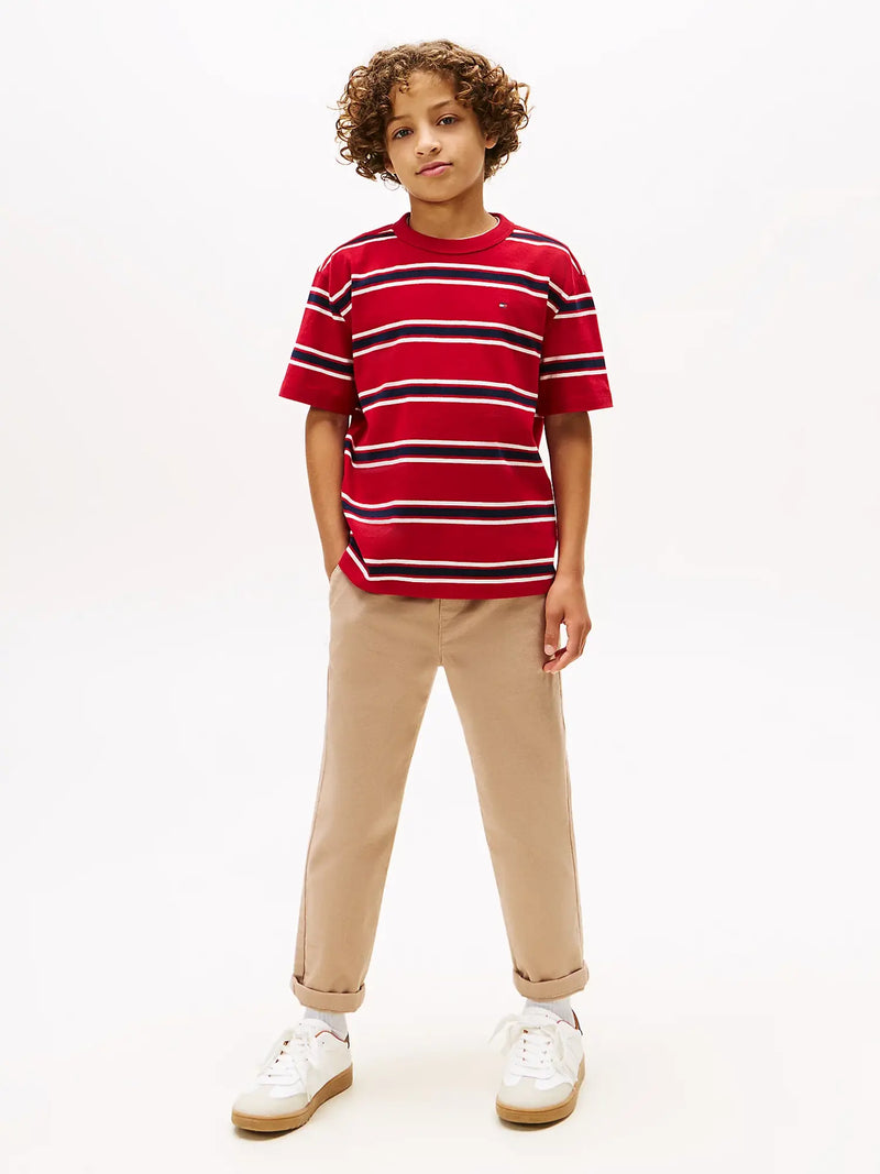 Boy wearing the Tommy Hilfiger striped t-shirt.
