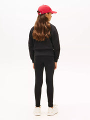 Back of the Tommy Hilfiger black sweatshirt & leggings.