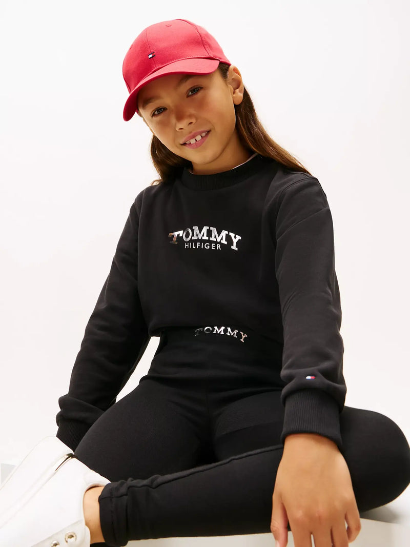Closer look at the Tommy Hilfiger sweatshirt & leggings showing detail of the silver foil logo.