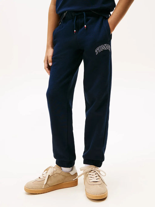 Closer view of the Tommy Hilfiger varsity track bottoms.
