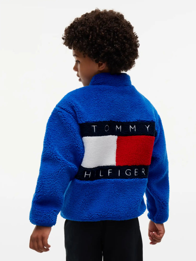 Tommy Hilfiger polar fleece with bold flag logo on the back.