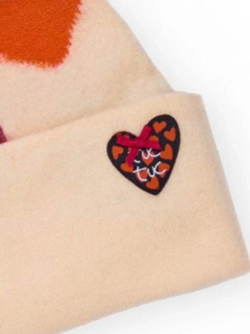 Closer look at the Tuc Tuc heart bobble hat.