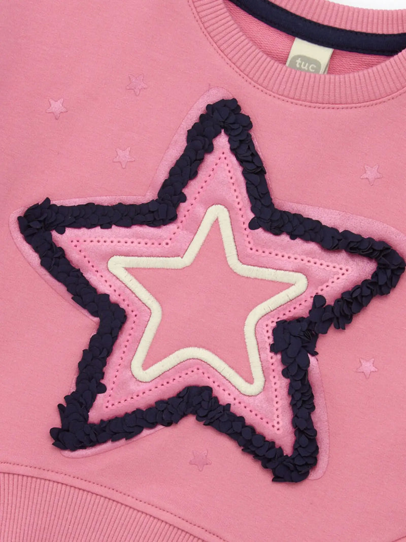 Tuc Tuc pink sweatshirt with embroidered star design.