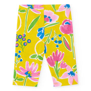 Rear view of the girl's printed leggings.