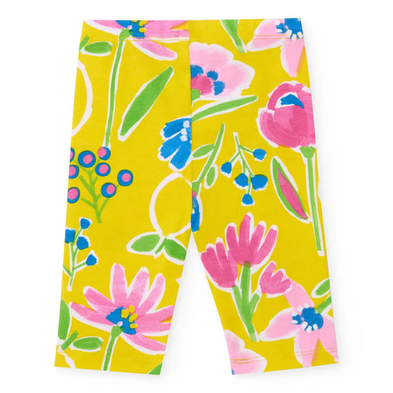 Rear view of the girl's printed leggings.