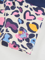 Tuc Tuc leopard print dress with heart logo patch at the hem.