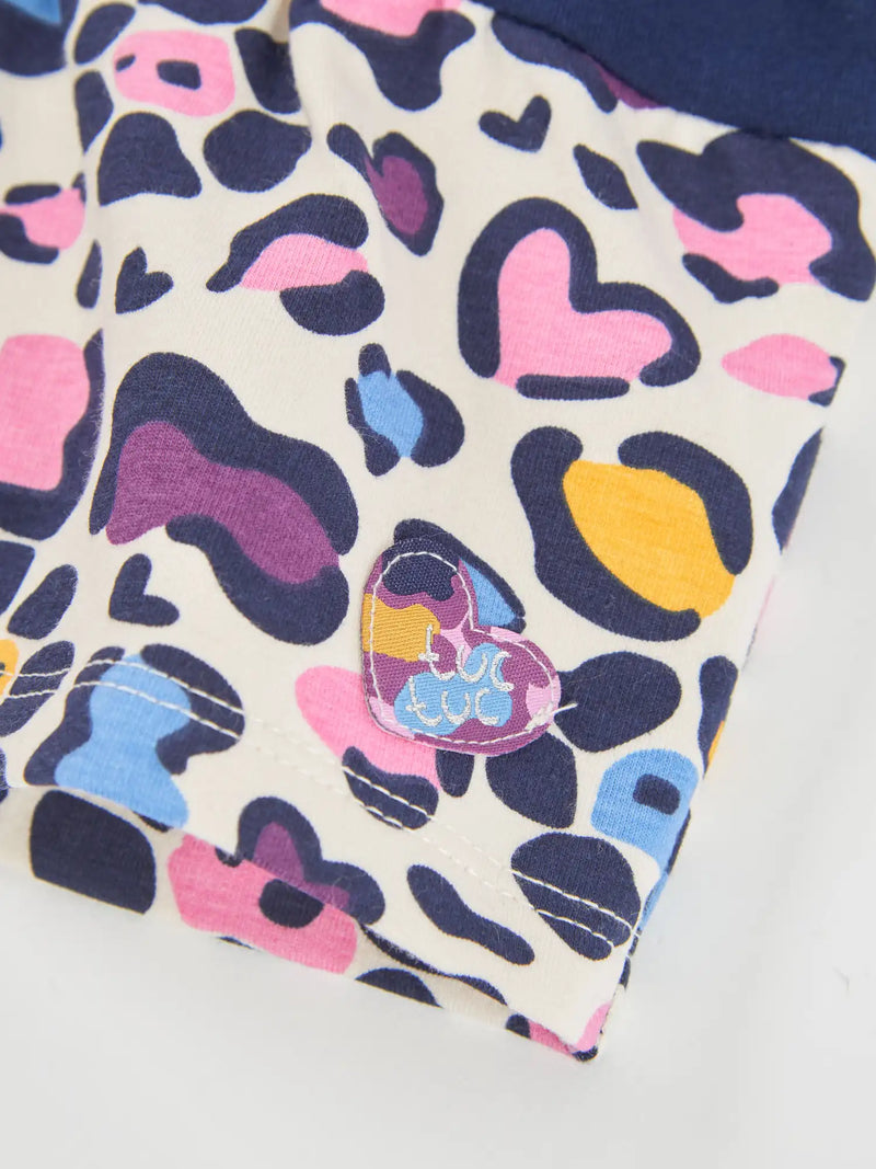 Tuc Tuc leopard print dress with heart logo patch at the hem.