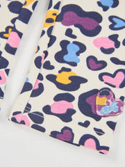 Tuc Tuc leopard print leggings with heart logo patch at the ankle.