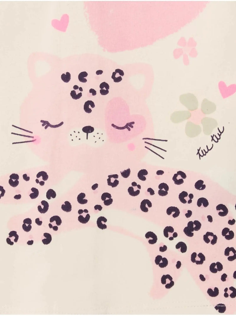 Closer look at the baby girl's t-shirt showing detail of the sleeping leopard print