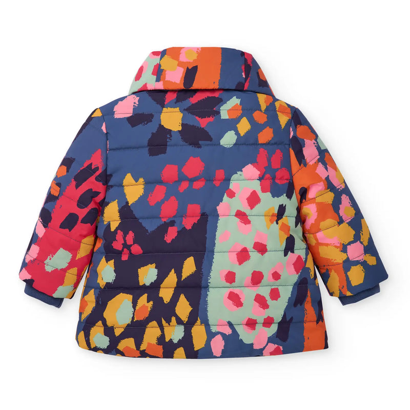 Rear view of the Tuc Tuc patterned coat.