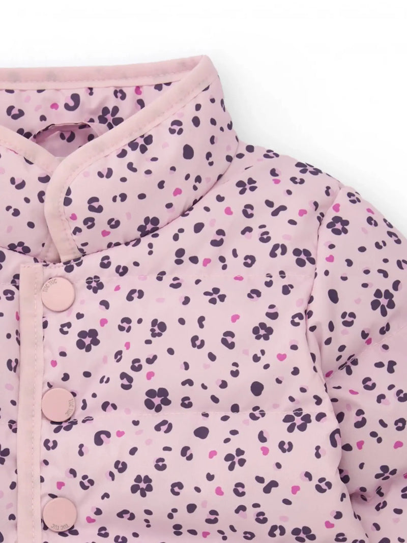 Closer look at the Tuc Tuc puffer jacket showing detail of the leopard print pattern