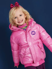 Smiling Girl modelling the Tuc Tuc puffer jacket.
