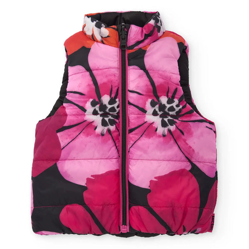 Floral print side of the Tuc Tuc reversible gilet.