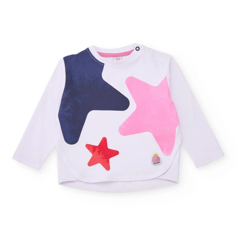 Girl's white t-shirt printed with oversized stars.