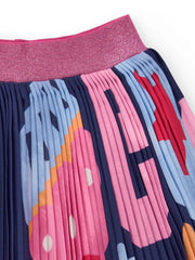 Girl's pleated skirt with abstract print pattern.