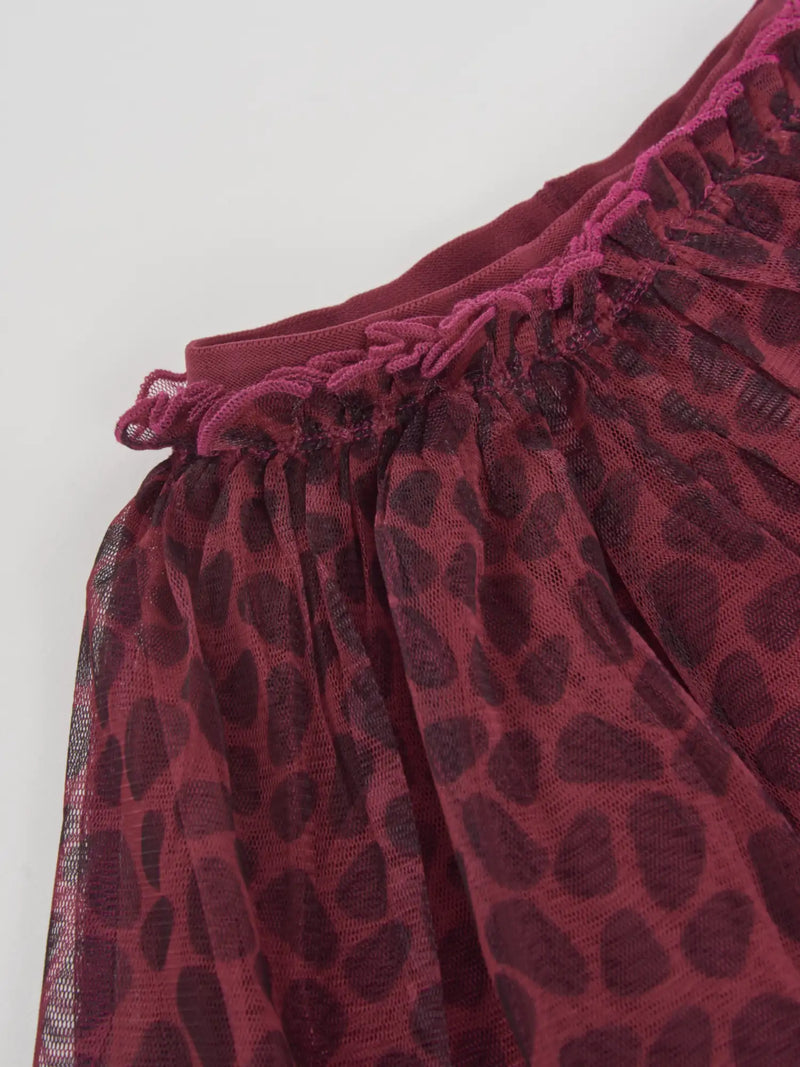 Closer look at the Tuc Tuc tulle skirt showing detail of the animal print pattern.