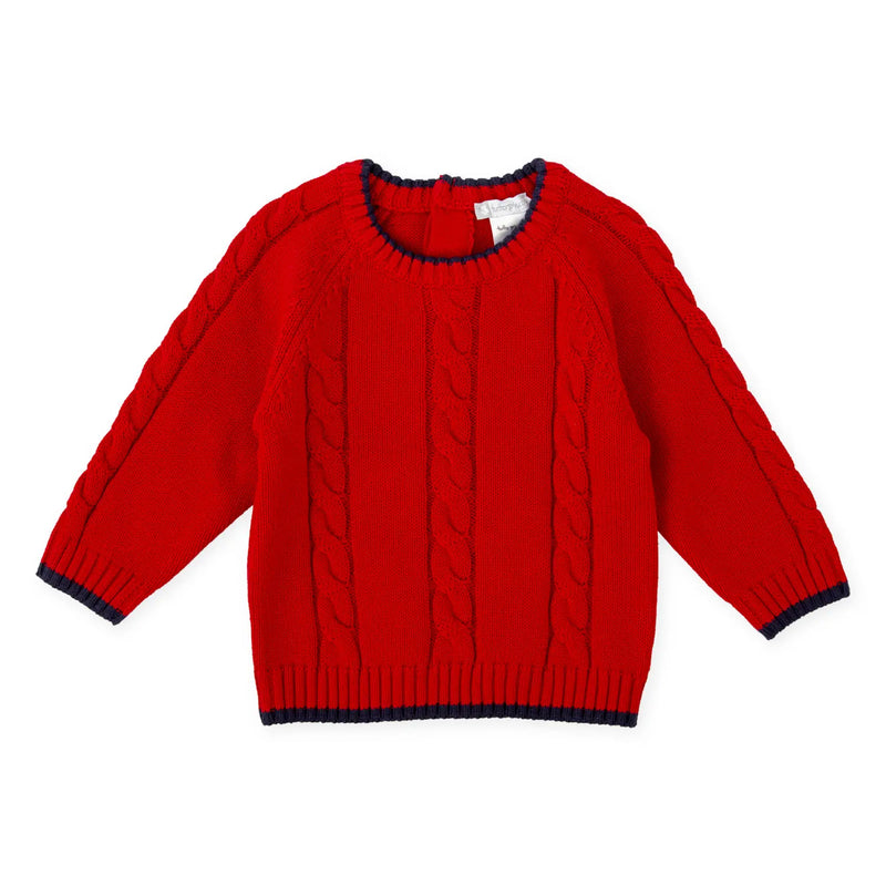 Baby boy's festive red jumper.