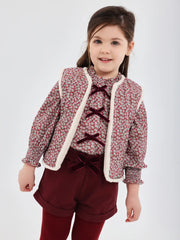 Girl modelling the Tutto Piccolo shorts set.