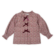 Girl's floral print blouse.