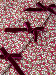 Tutto Piccolo blouse with burgundy velvet bows.