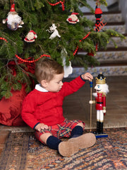 Baby boy wearing the Tutto Piccolo tartan shorts set.