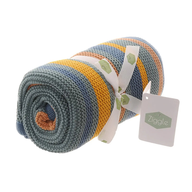Closer view of the Ziggle baby blanket orange, blue & green stripes.