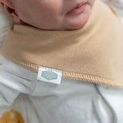 Closer look at the beige Ziggle bandana bib.