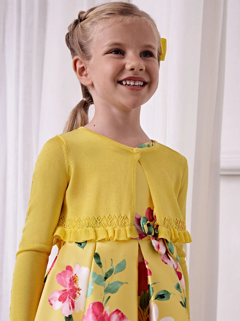 Girl modelling the Abel and Lula cardigan.