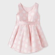Reverse side of the Abel and Lula pink polka dot dress.