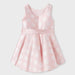 Reverse side of the Abel and Lula pink polka dot dress.