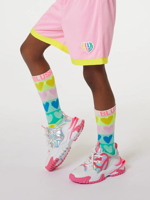 Girl modelling the Billieblush heart socks.