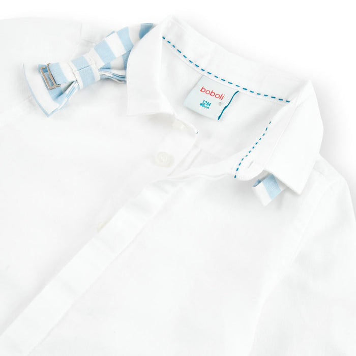 Boy's white shirt with blue and white striped bow tie.