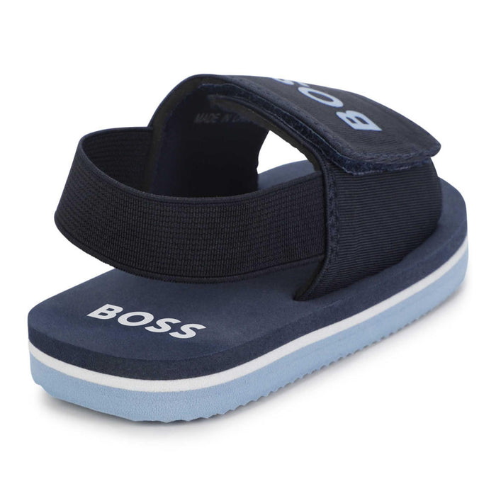Rear view of the BOSS navy blue slides.