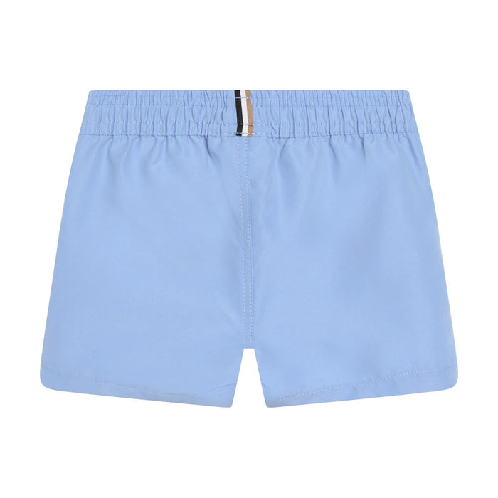 Reverse view of the BOSS pale blue swim shorts.