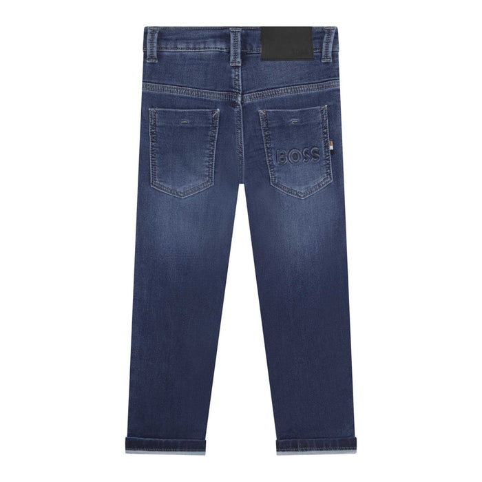 Boss boy's jeans, in dark blue with a black logo patch on the back.